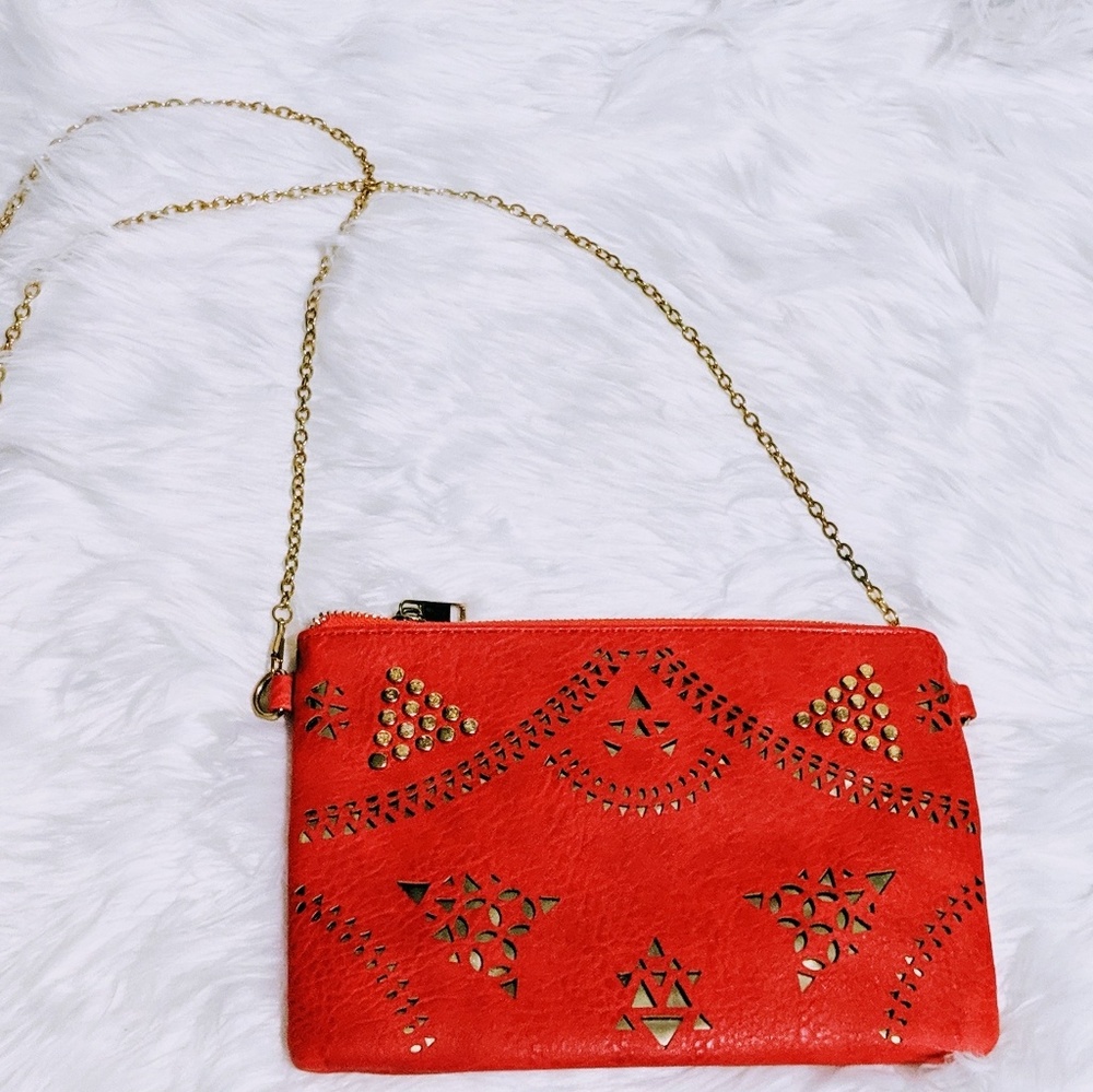 Purse w/ triangular cutouts & studs, chain strap